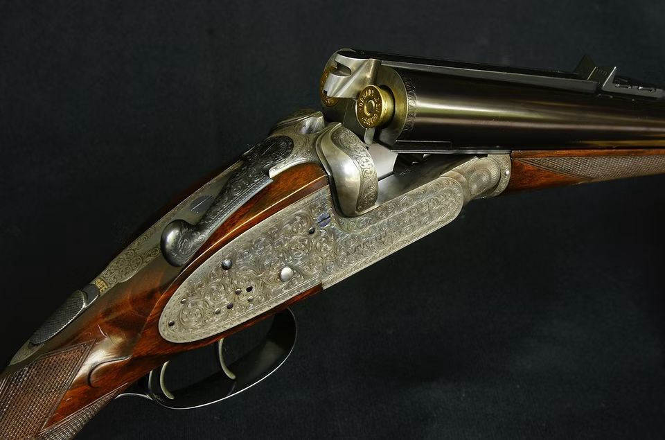 Close detail of the engraved action of a classic double rifle